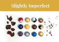 Assorted handmade bonbons with minor cosmetic imperfections in a box